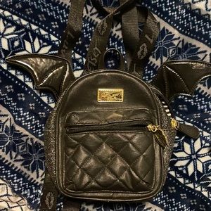 Never used Betsey Johnson mini bat backpack. Totally adorable Glitter trim